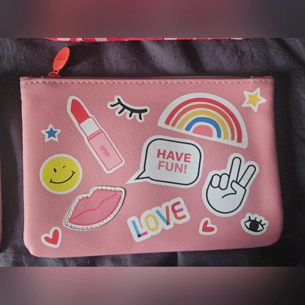 4 ipsy makeup/travel bags